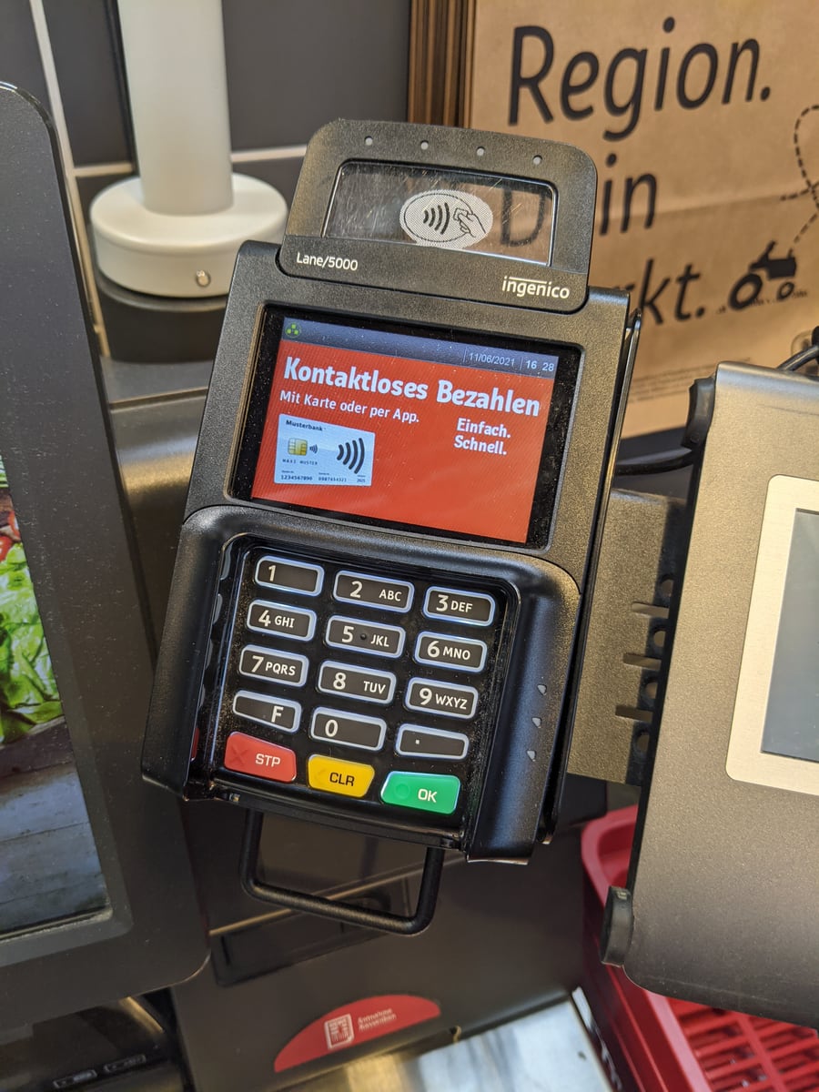 Contactless payment terminal installed at a supermarket self-checkout