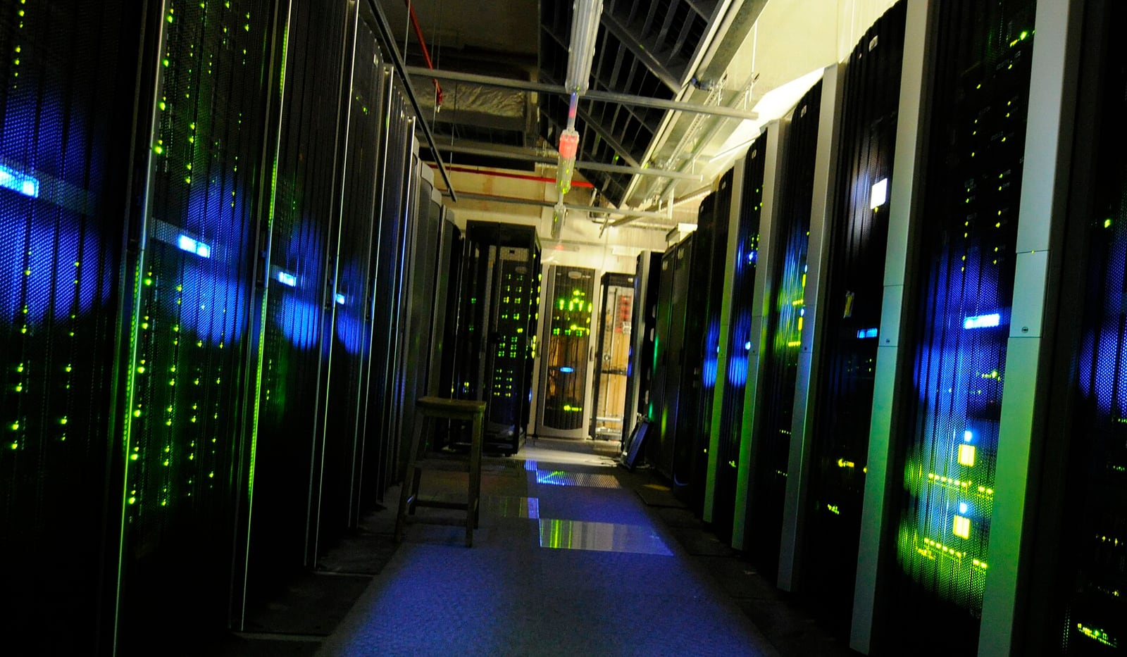 Rows of active server cabinets in the server room at The National Archives in the United Kingdom