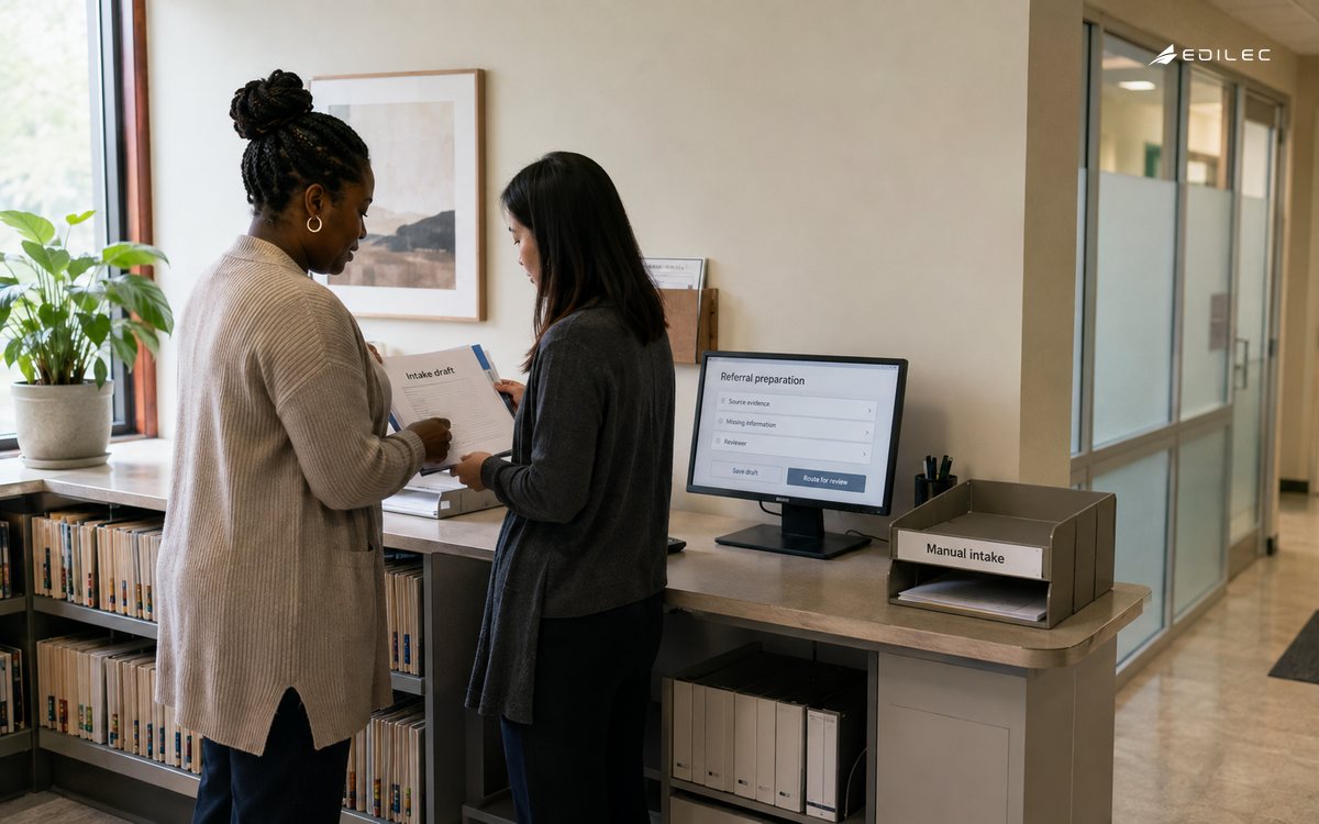 Clinic administrative staff review an intake draft beside evidence and manual-fallback tools.
