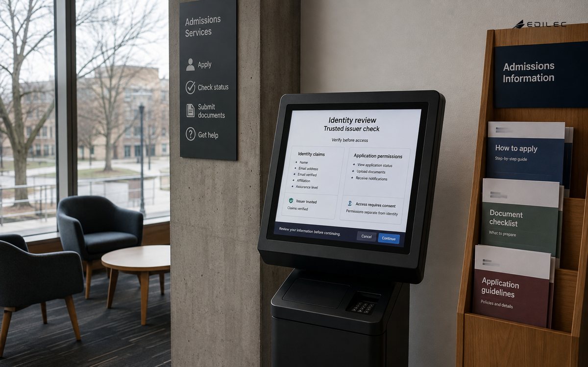 Wide photograph of a university admissions self-service alcove with a modest opaque kiosk screen, seats and paper guidance rack.