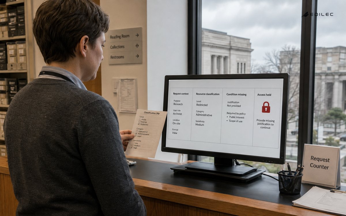 Shoulder-height candid photograph of a standing records steward at an archive request counter comparing a classification slip with a modest opaque monitor.
