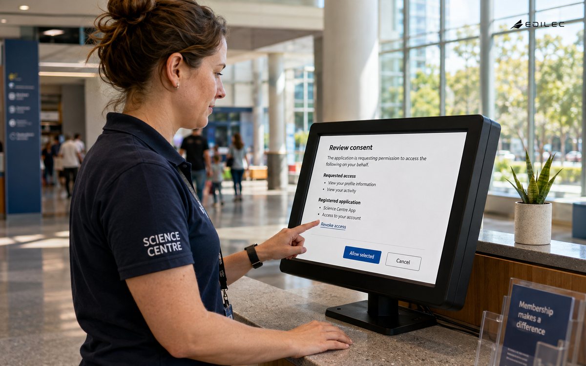 A staff member reviews the requested scope on a consent kiosk.
